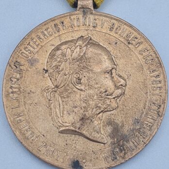 Kriegsmedaille 1873 mit Walzenöse am Band